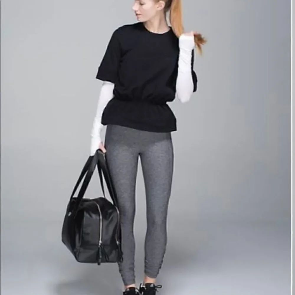 Size 4 Black Rare Lululemon Peplum Pullover